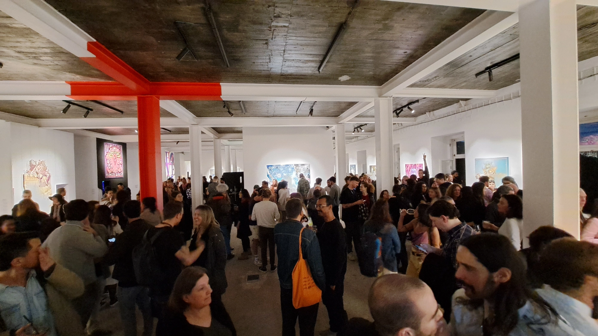 crowd at the opening day of choice collective art show by because art matters at principe real, lisbon